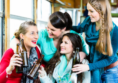Friends in a party bus celebrating